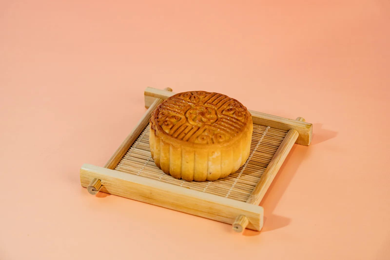 PAPILLON mooncake on bamboo tray